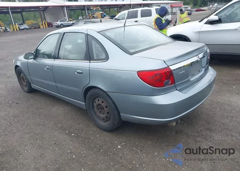 2003 Saturn L-Series L300 z USA, uszkodzony, nr VIN 1G8JW54R03Y573151